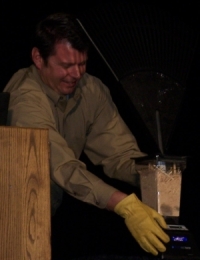 George Wright brends a rake in a BlendTec domestic blender